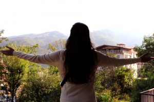 Girl enjoying mountain view, mountain view- TravelPlacesIndia